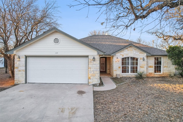 single story home featuring a garage