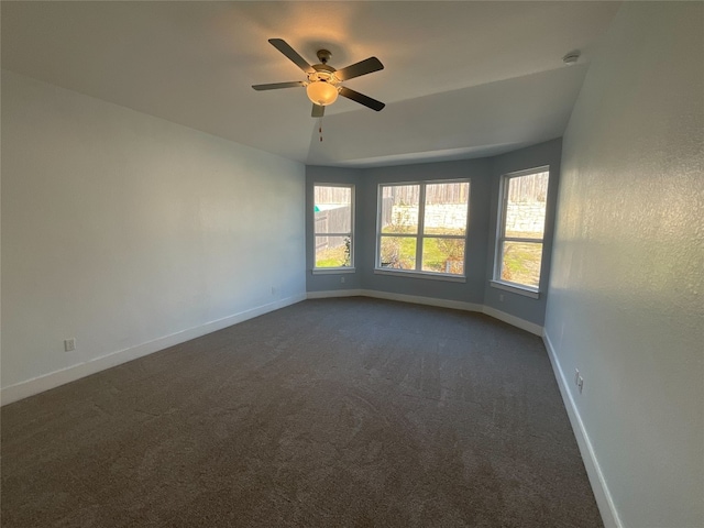 2120 Prairie Oaks Dr, Georgetown, TX 78628 - unfurnished room featuring dark carpet and a ceiling fan