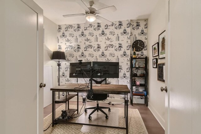 office space with wood-type flooring and ceiling fan