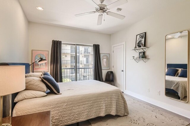 bedroom featuring access to exterior and ceiling fan