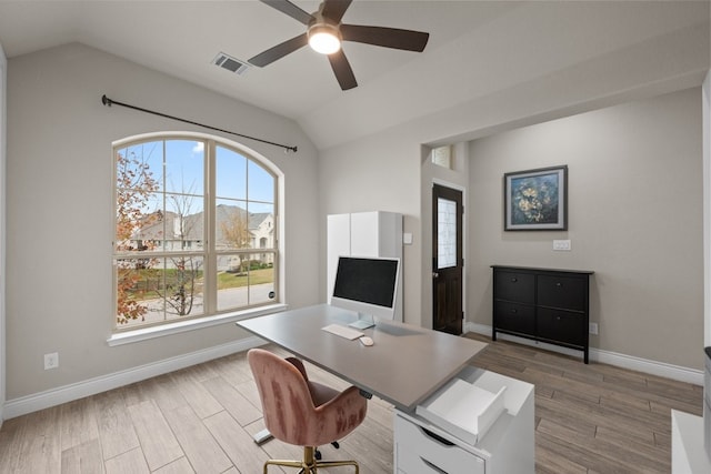 office area with ceiling fan, lofted ceiling, and light wood-type flooring