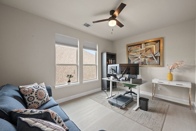 office area featuring ceiling fan and light wood-type flooring