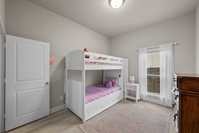 bedroom featuring light wood-type flooring