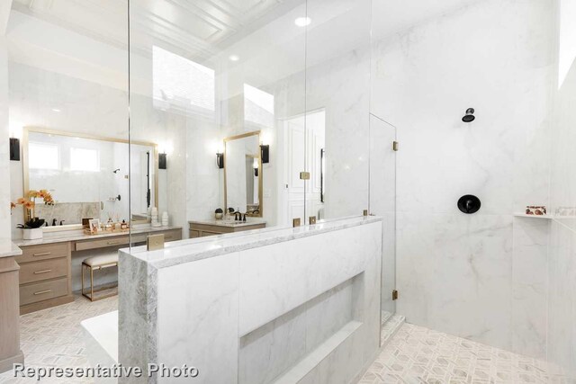 1304 Jolie Rose Bnd, Leander, TX 78641 - bathroom featuring vanity, a tile shower, and tile walls