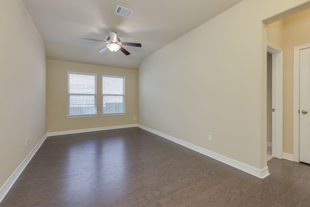 unfurnished room with ceiling fan and dark hardwood / wood-style flooring