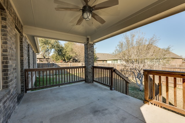 view of patio featuring ceiling fan