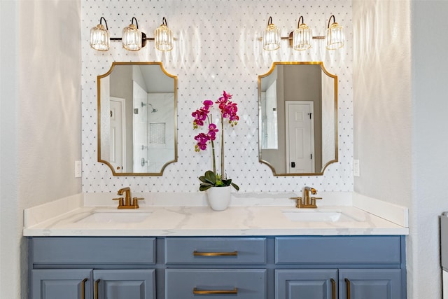 bathroom with vanity and a shower