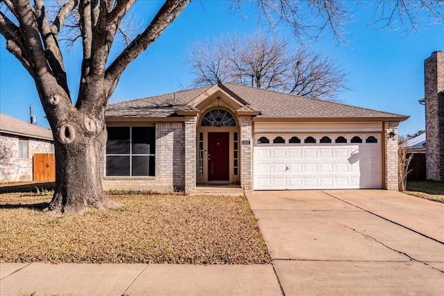 single story home featuring a garage