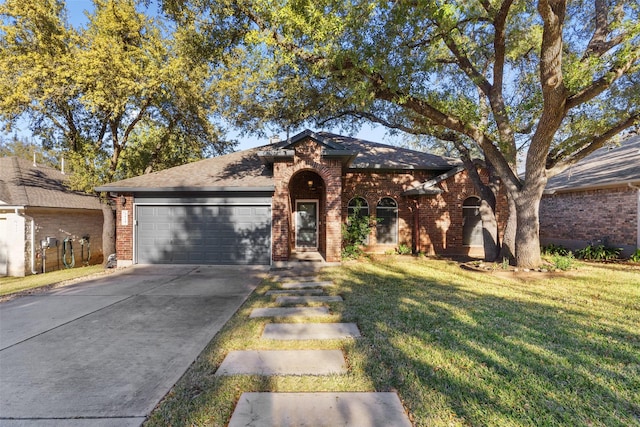 single story home with a garage and a front yard