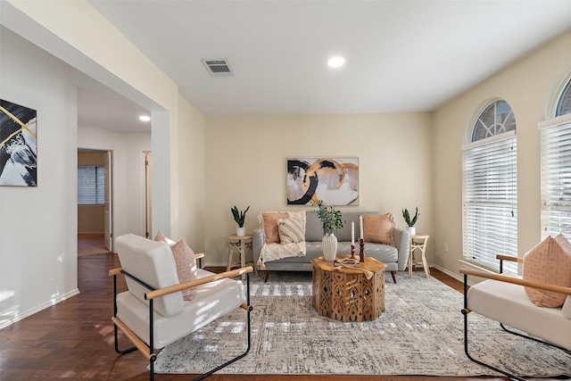 living room featuring dark hardwood / wood-style flooring