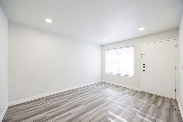 entrance foyer featuring light hardwood / wood-style floors