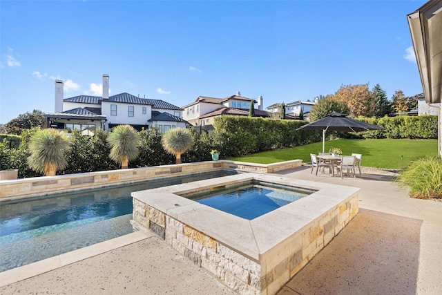 view of pool with an in ground hot tub, a gazebo, a patio area, and a lawn