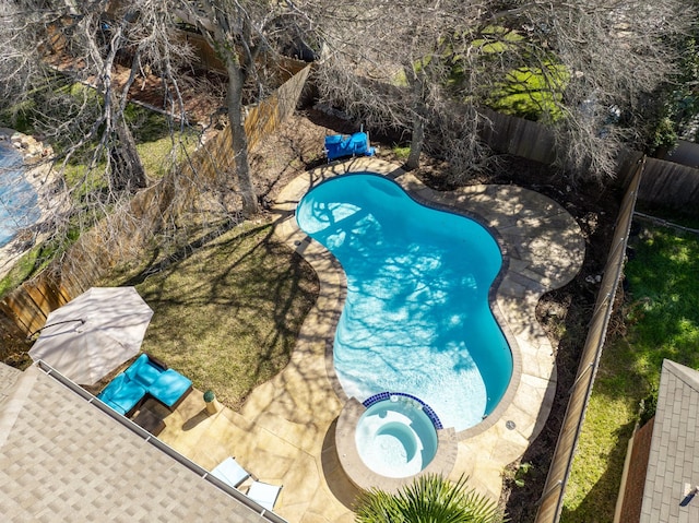 view of pool featuring an in ground hot tub and a patio