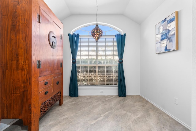 interior space featuring lofted ceiling