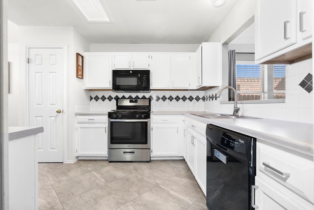 kitchen with light tile patterned flooring, white cabinetry, sink, decorative backsplash, and black appliances