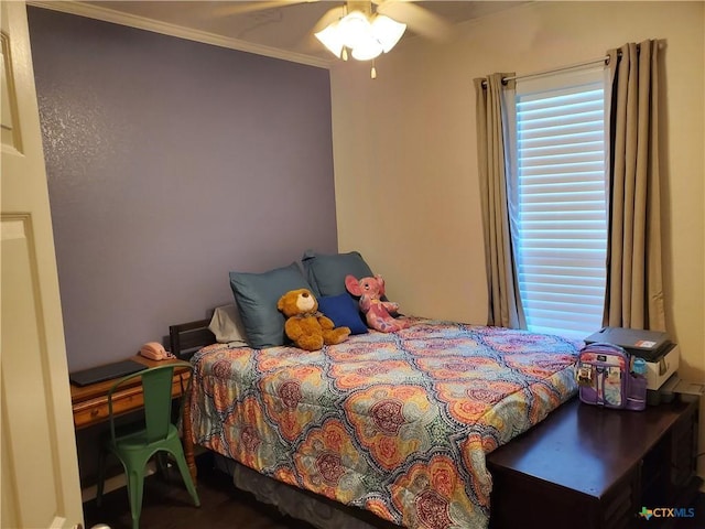 bedroom with crown molding and ceiling fan