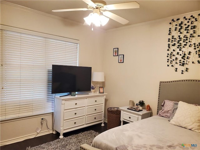 bedroom featuring crown molding and ceiling fan