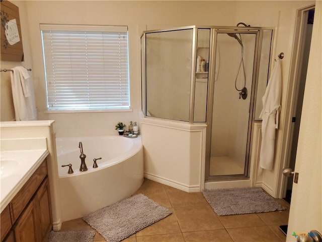 bathroom with vanity, tile patterned floors, and independent shower and bath