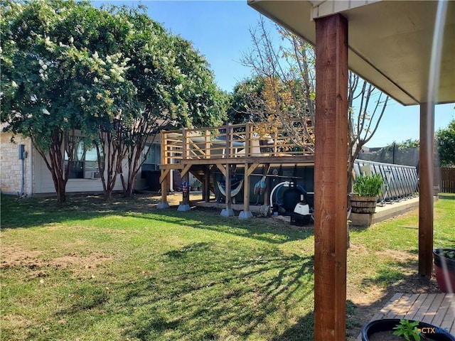 view of yard featuring a wooden deck