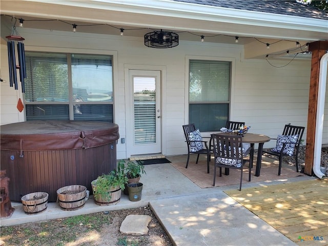 view of patio / terrace featuring a hot tub