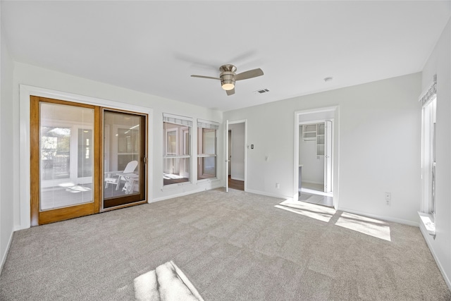 interior space featuring ceiling fan