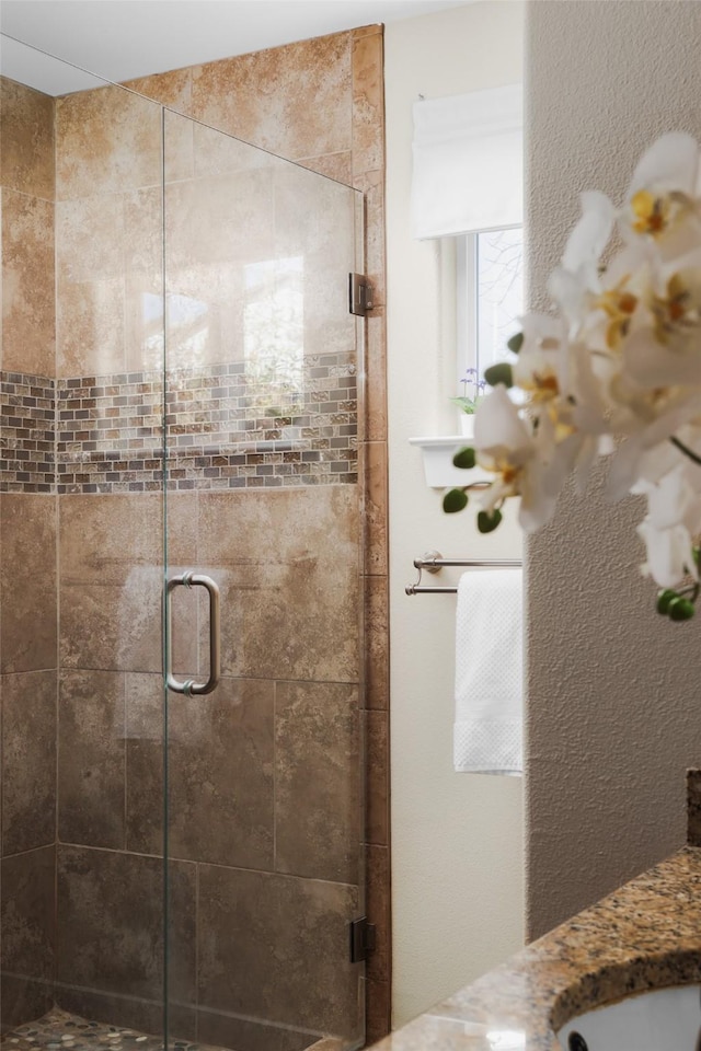 bathroom featuring walk in shower