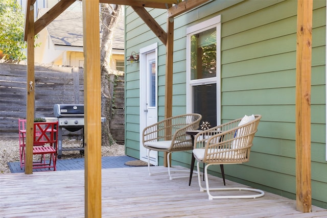 wooden terrace with grilling area