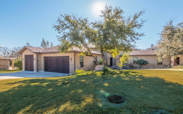 7804 Lazy River Cv, Austin, TX 78730 - single story home featuring an attached garage, a front lawn, stone siding, and concrete driveway