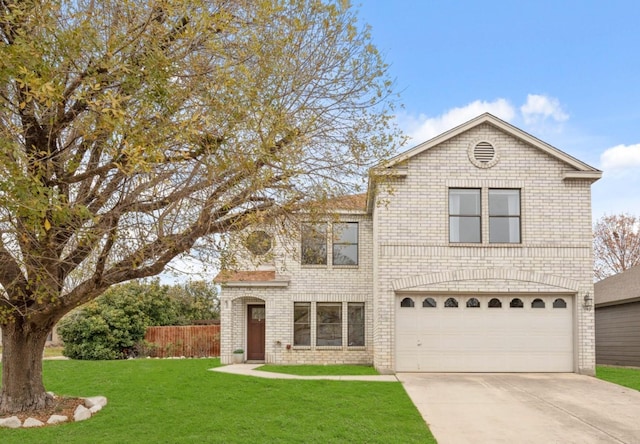 front facade featuring a garage and a front yard