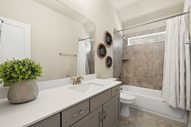 full bathroom with vanity, shower / tub combo, and toilet