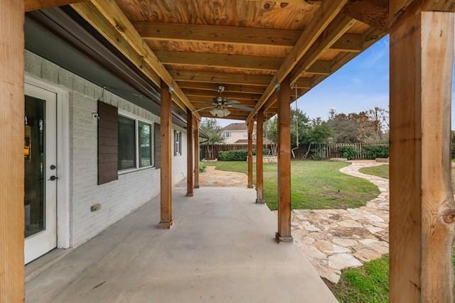 view of patio featuring ceiling fan