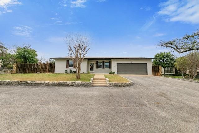 single story home with a garage