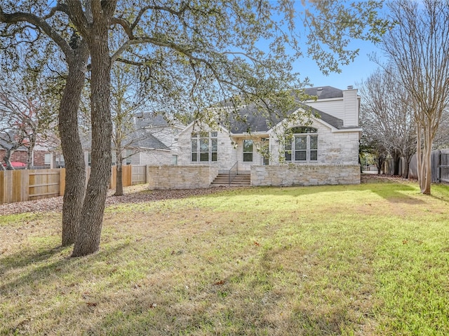 view of front of house with a front yard