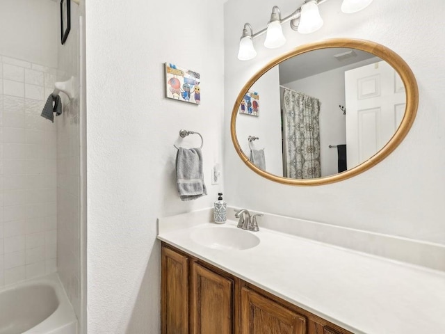 bathroom featuring vanity and shower / bath combo