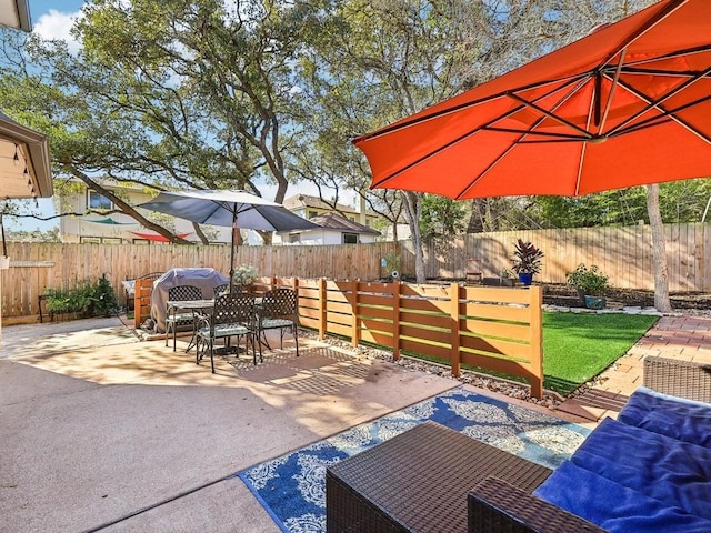 view of patio / terrace with grilling area and outdoor lounge area