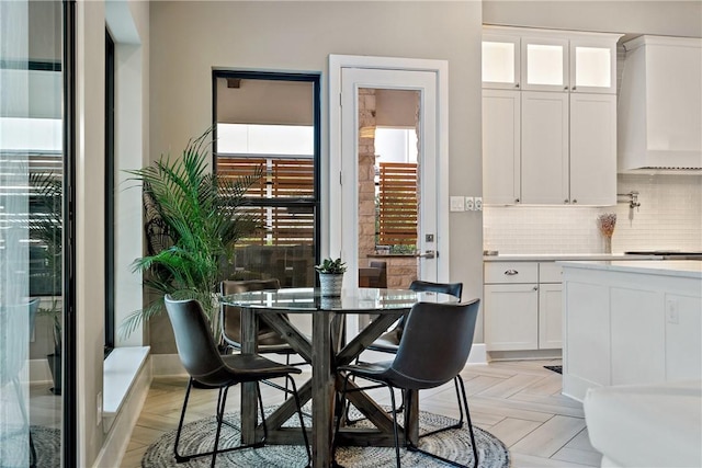 dining room with light parquet floors