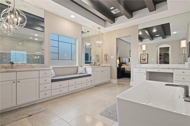 bathroom with beamed ceiling, tile patterned floors, vanity, and a chandelier