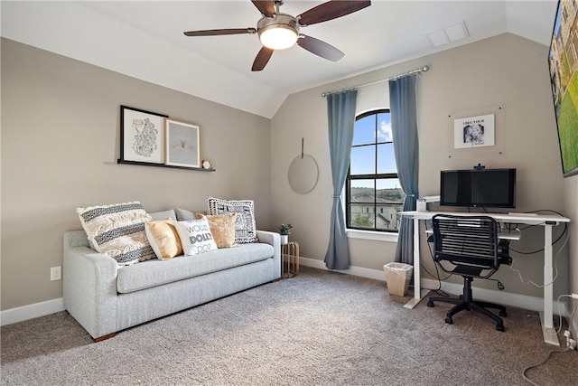 carpeted office with ceiling fan and vaulted ceiling