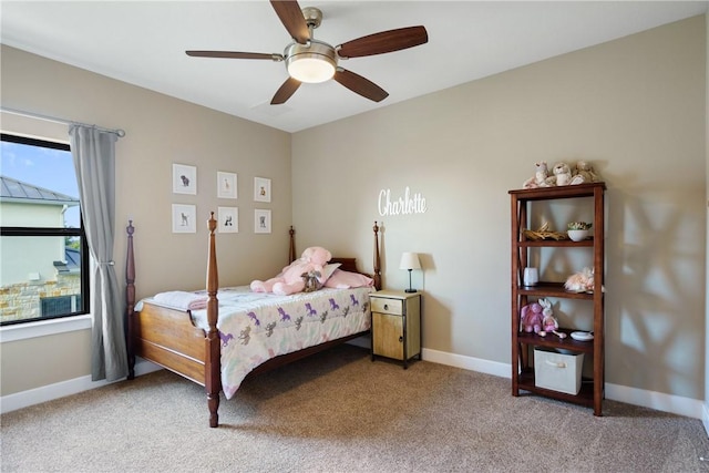 bedroom with ceiling fan and carpet flooring