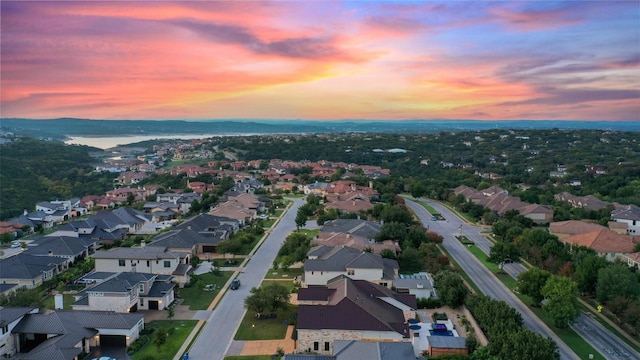 107 Bisset Ct, Austin, TX 78738 - aerial view at dusk featuring a residential view