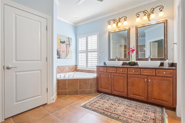 215 Goose Island Dr, Georgetown, TX 78633 - full bath with double vanity, a garden tub, crown molding, and tile patterned flooring