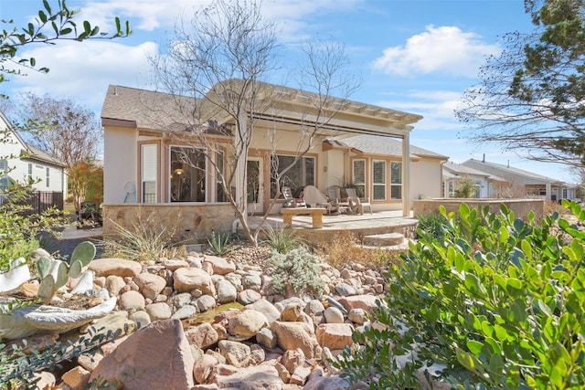 215 Goose Island Dr, Georgetown, TX 78633 - rear view of house featuring stucco siding and a patio