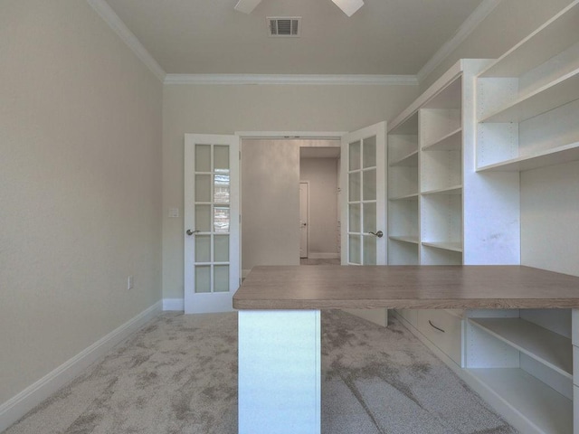 interior space with ornamental molding, carpet flooring, and french doors