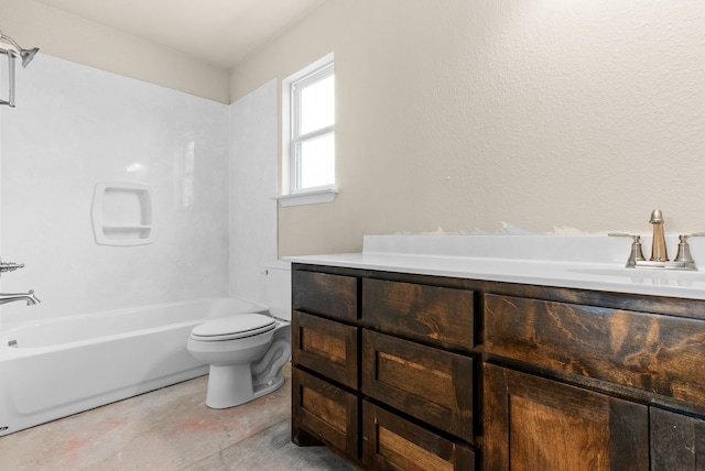 full bathroom featuring vanity, washtub / shower combination, and toilet