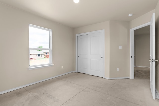 unfurnished bedroom featuring a closet