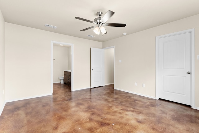 unfurnished bedroom featuring ceiling fan and connected bathroom