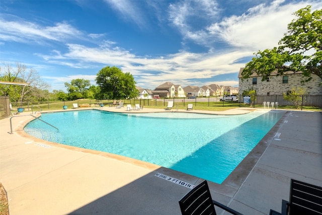 116 Freeman Day Dr, Bastrop, TX 78602 - community pool with a patio and a residential view