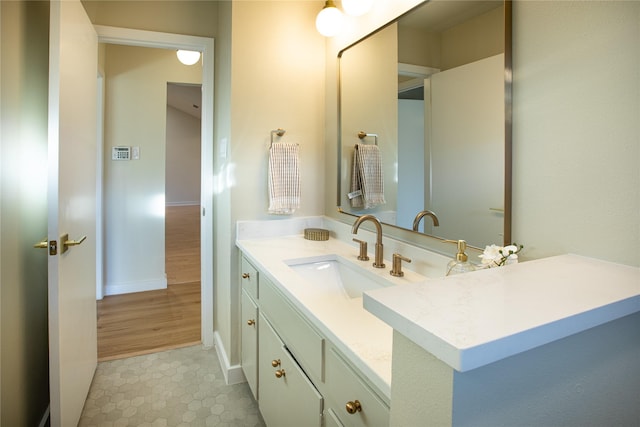 bathroom featuring vanity and tile patterned flooring