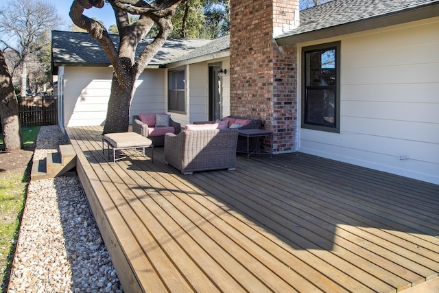 deck featuring an outdoor living space