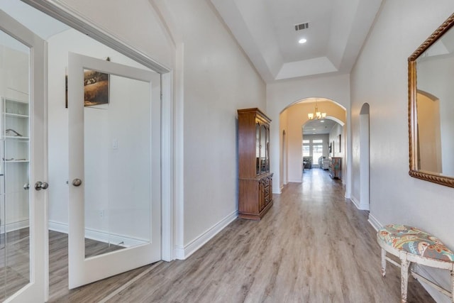 hall with light hardwood / wood-style flooring